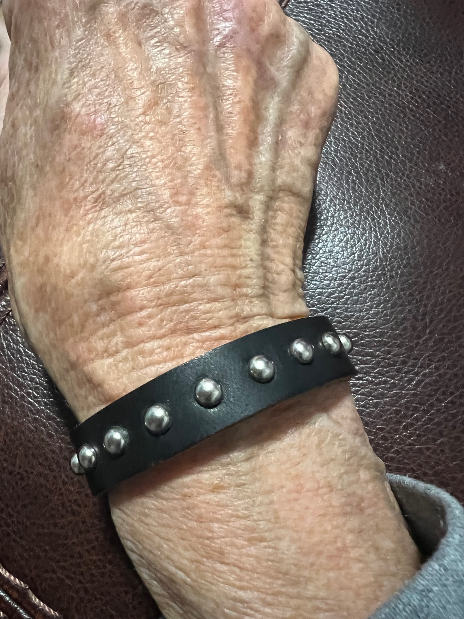 Leather accessory cuff with harness spots