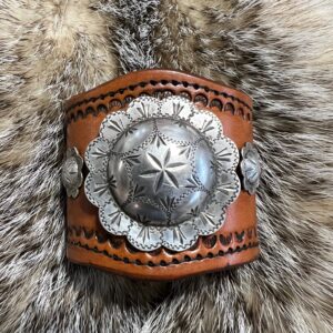 Antique domed sterling silver concho cuff.